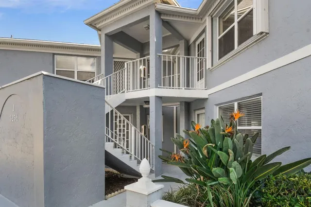 a flower plants in front of house