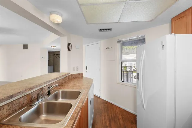 a bathroom with a sink a vanity and a mirror
