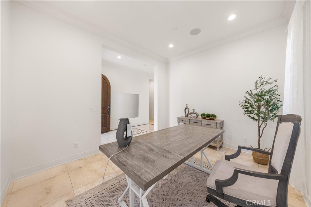92 Interstellar Irvine, CA 92618 - Photo 12 of 64 a living room with furniture and a potted plant
