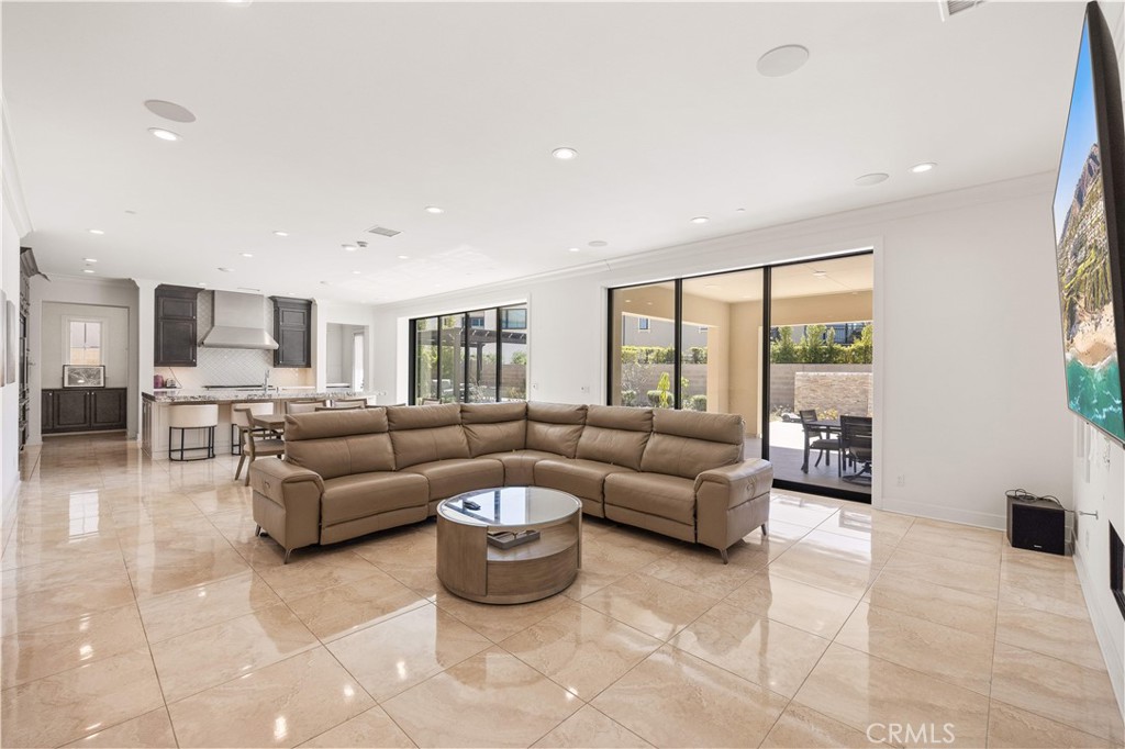 92 Interstellar Irvine, CA 92618 - Photo 18 of 64 a living room with furniture and a large window