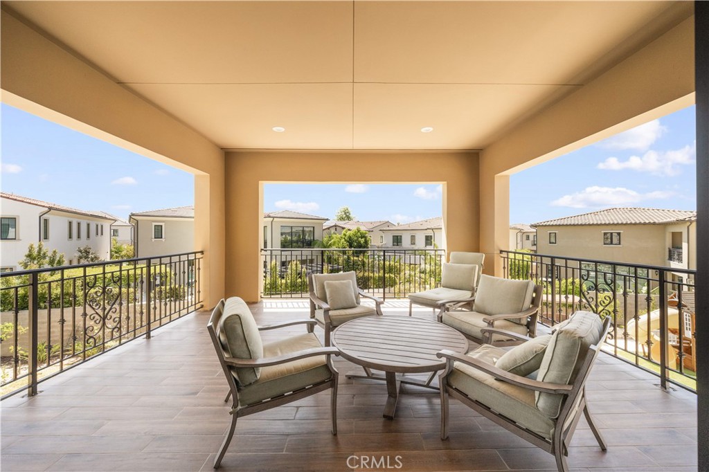 92 Interstellar Irvine, CA 92618 - Photo 28 of 64 a balcony with furniture and outdoor view