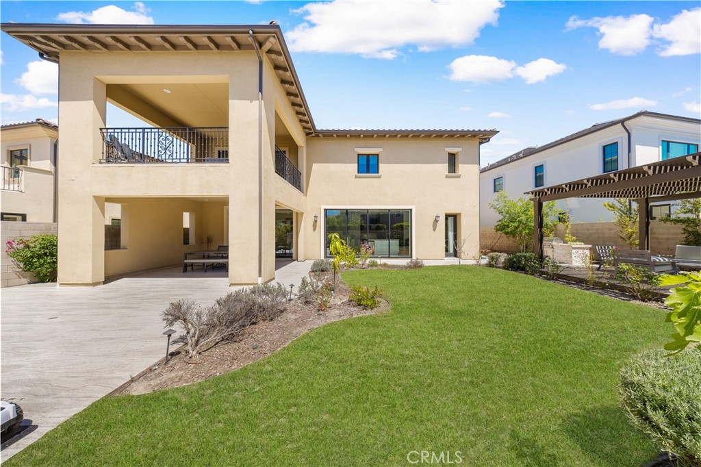92 Interstellar Irvine, CA 92618 - Photo 3 of 64 a view of an house with backyard and a garden