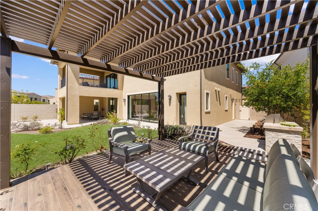 92 Interstellar Irvine, CA 92618 - Photo 39 of 64 a view of a patio with chairs and potted plants