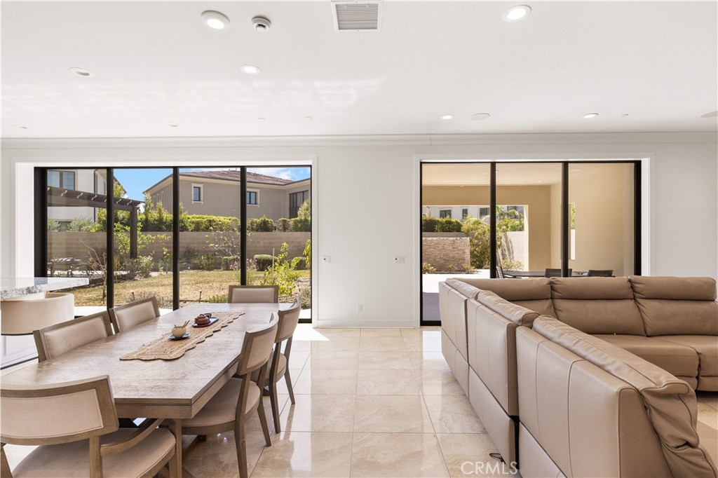 92 Interstellar Irvine, CA 92618 - Photo 7 of 64 a living room with furniture and a large window