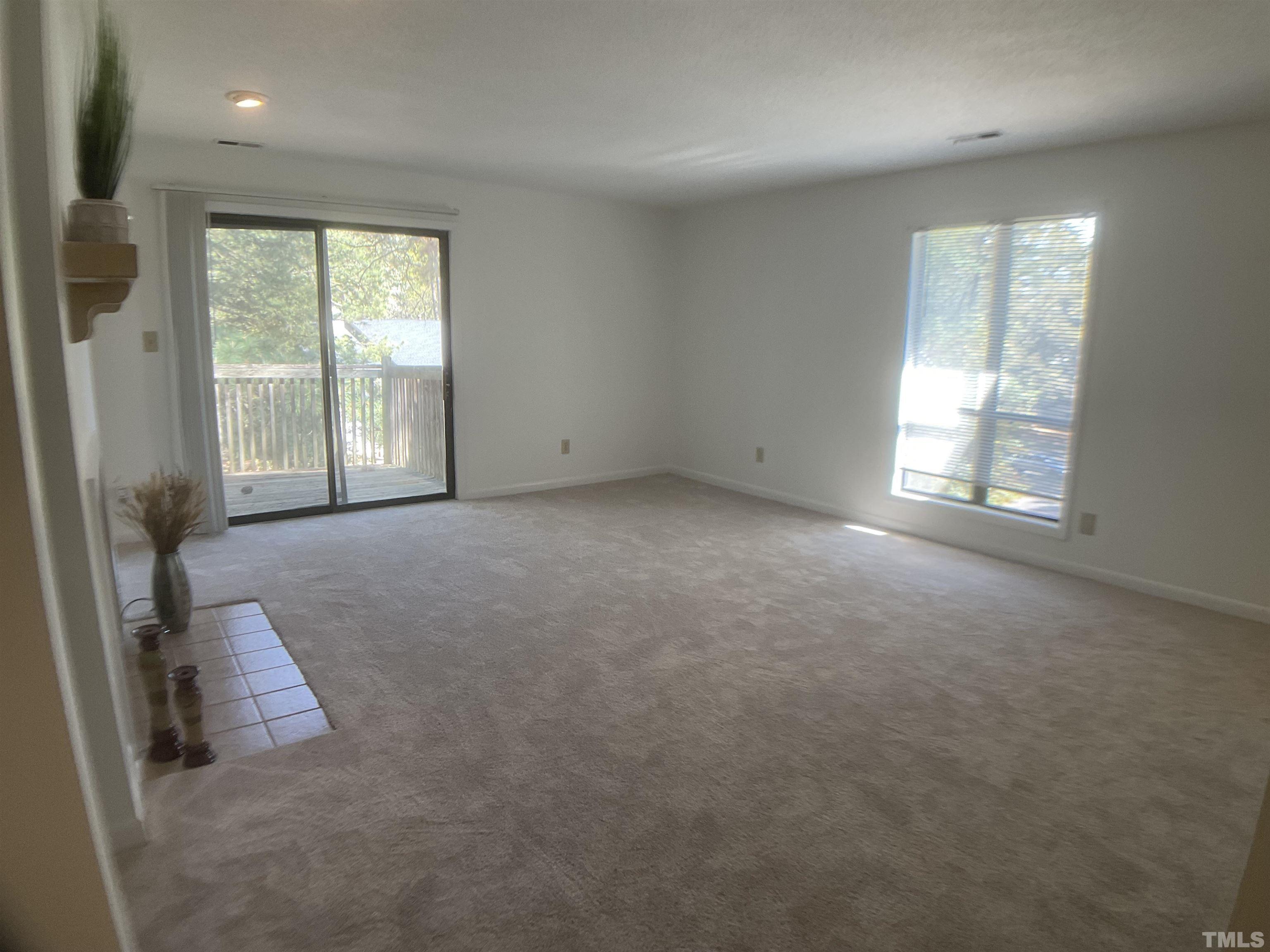 5812 Pointer Drive, Unit 202 Raleigh, NC 27609 - Photo 9 of 19 an empty room with windows