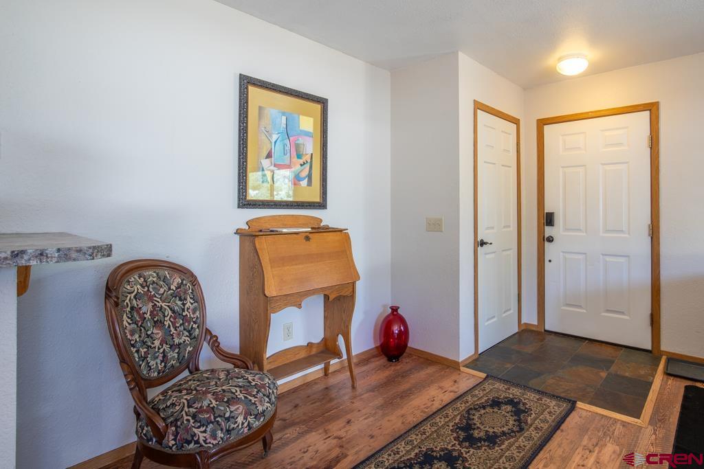 128 Hermosa Circle Durango, CO 81301 - Photo 11 of 26 a living room with furniture and a window