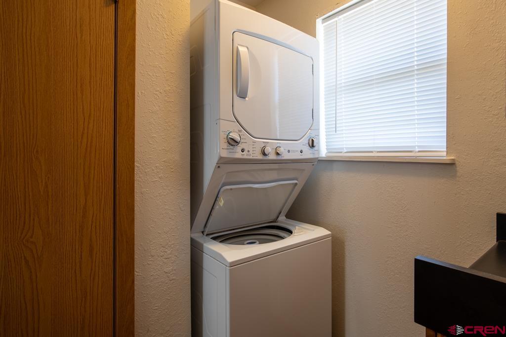 128 Hermosa Circle Durango, CO 81301 - Photo 23 of 26 a bathroom with a toilet sink and mirror