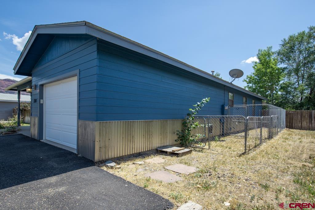 128 Hermosa Circle Durango, CO 81301 - Photo 5 of 26 a view of a house with a yard