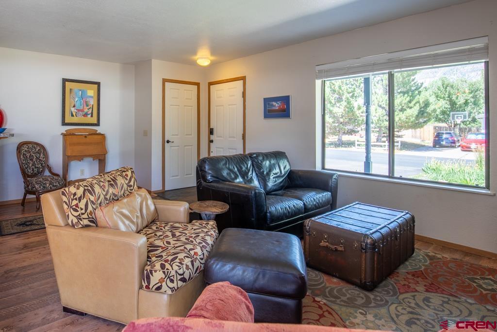 128 Hermosa Circle Durango, CO 81301 - Photo 9 of 26 a living room with furniture and a window