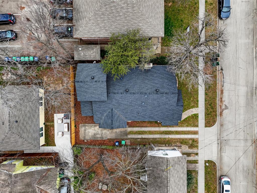 1111 North Austin Street Denton, TX 76201 - Photo 22 of 28 an aerial view of a house with a yard
