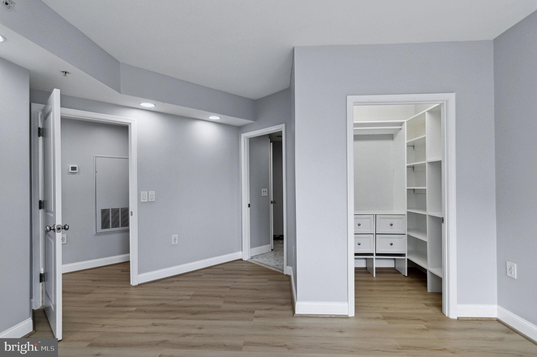 851 North Glebe Road, Unit 1404 Arlington, VA 22203 - Photo 28 of 62 a view of livingroom with hardwood floor and a bathroom