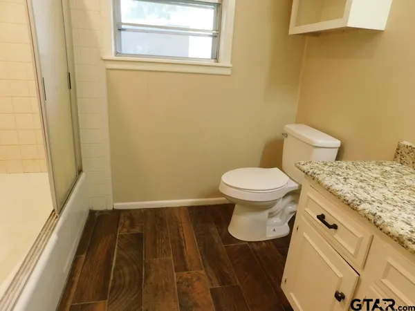 a bathroom with a sink and a toilet