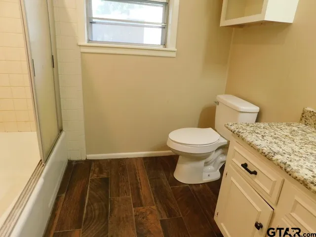 a bathroom with a sink and a toilet