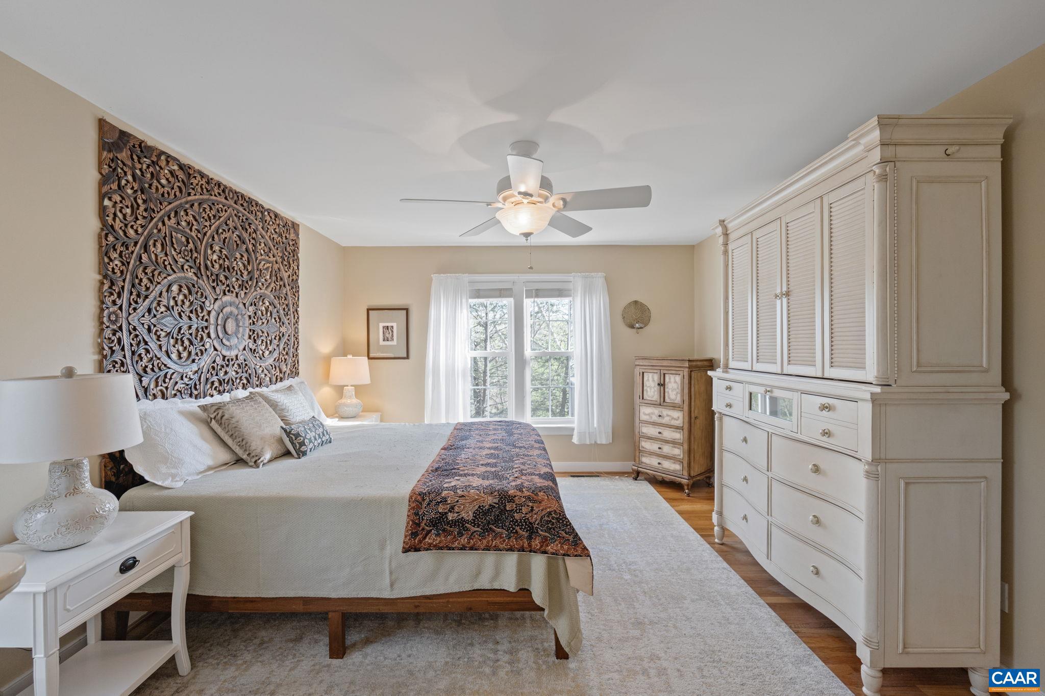 10 Mechunk Terrace Palmyra, VA 22963 - Photo 27 of 62 a bedroom with a large bed and a window