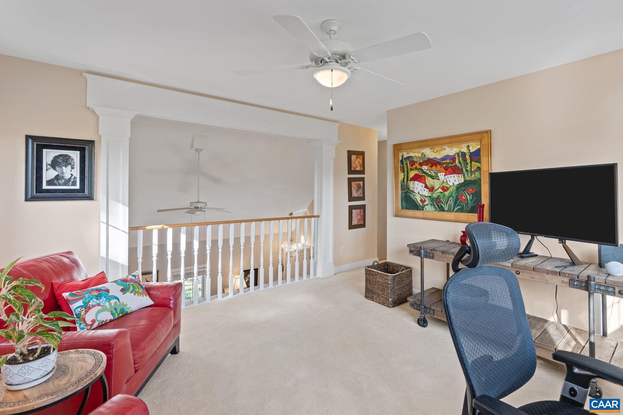 10 Mechunk Terrace Palmyra, VA 22963 - Photo 37 of 62 a living room with furniture flowerpot and a window