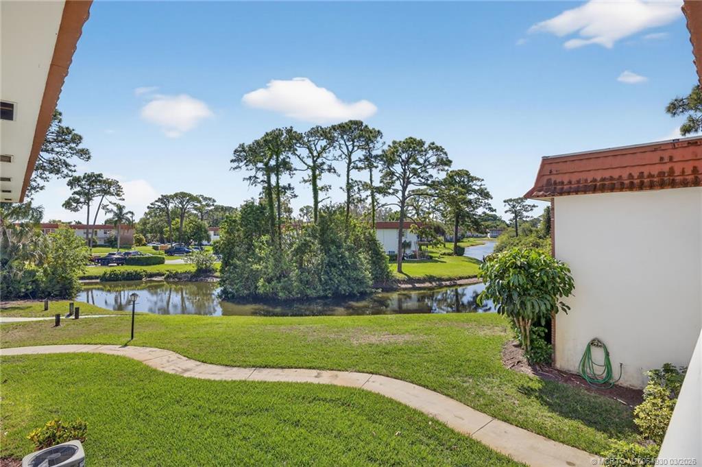 1225 Northwest 21st Street, Unit 1810 Stuart, FL 34994 - Photo 2 of 48 a view of a park