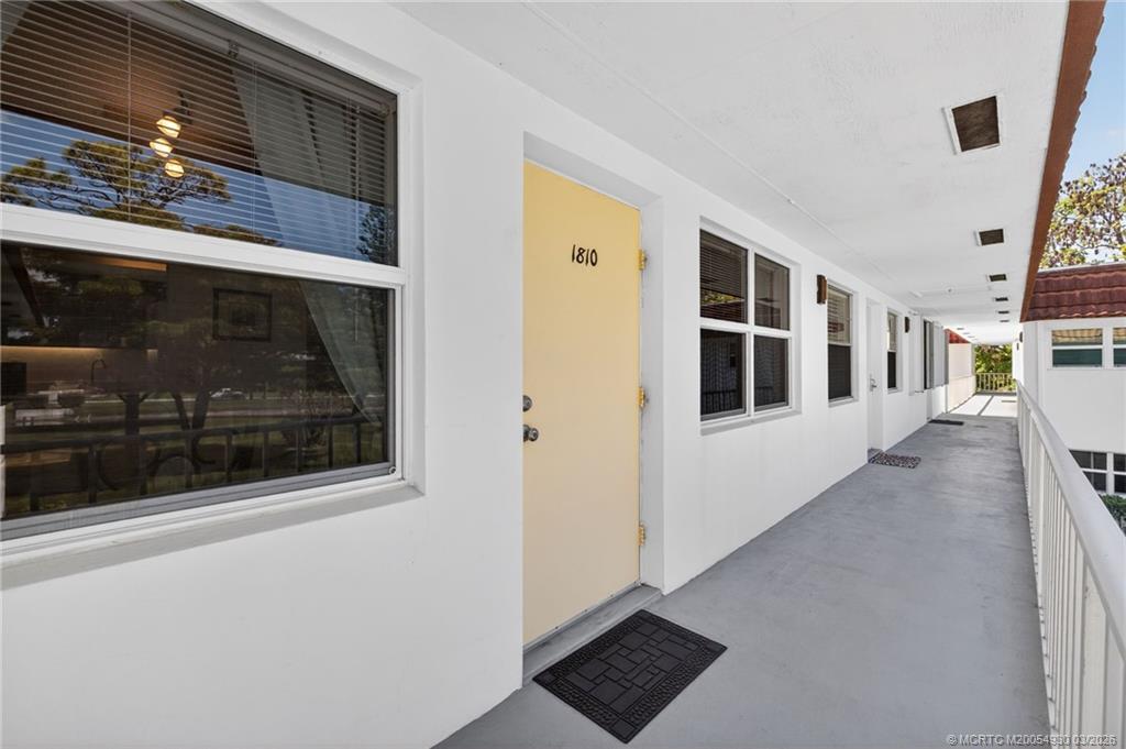1225 Northwest 21st Street, Unit 1810 Stuart, FL 34994 - Photo 22 of 48 a view of an entryway with sitting area