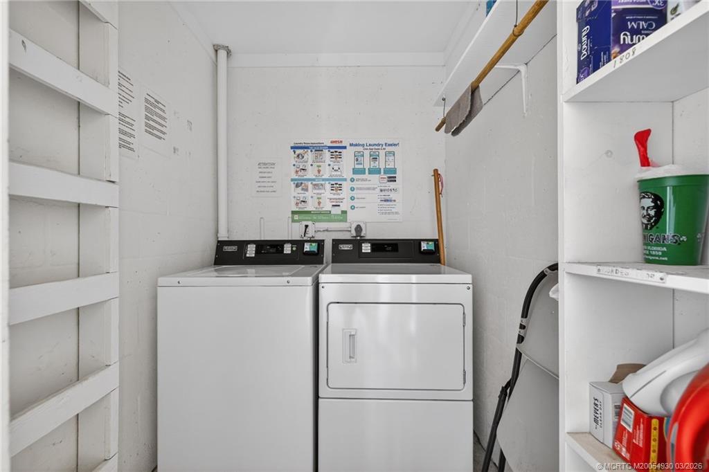 1225 Northwest 21st Street, Unit 1810 Stuart, FL 34994 - Photo 23 of 48 a room with storage and utility