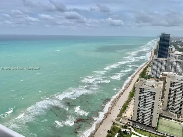 a view of a lake from a balcony
