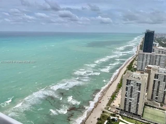 a view of a lake from a balcony