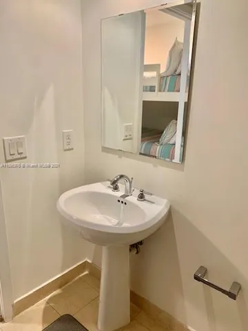 a balcony with a view of the ocean