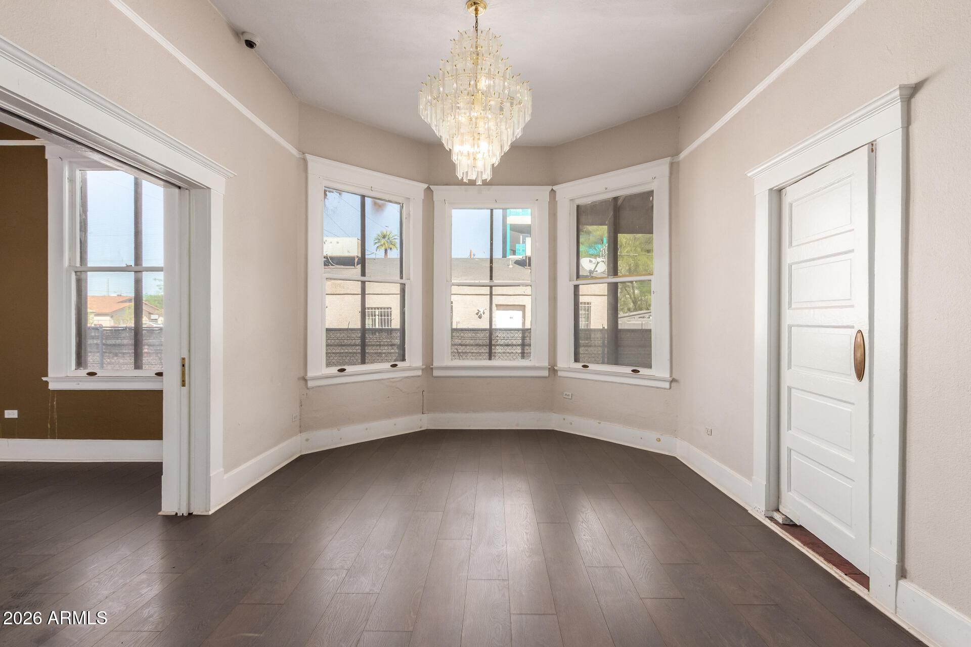 819 South 3rd Avenue Phoenix, AZ 85003 - Photo 11 of 45 a view of livingroom with hardwood floor and window