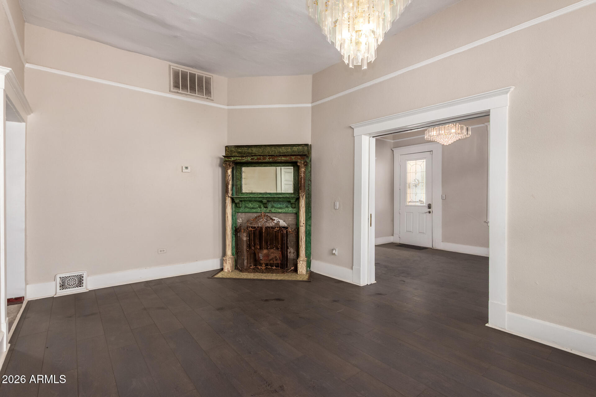 819 South 3rd Avenue Phoenix, AZ 85003 - Photo 12 of 45 an empty room with windows and entrance