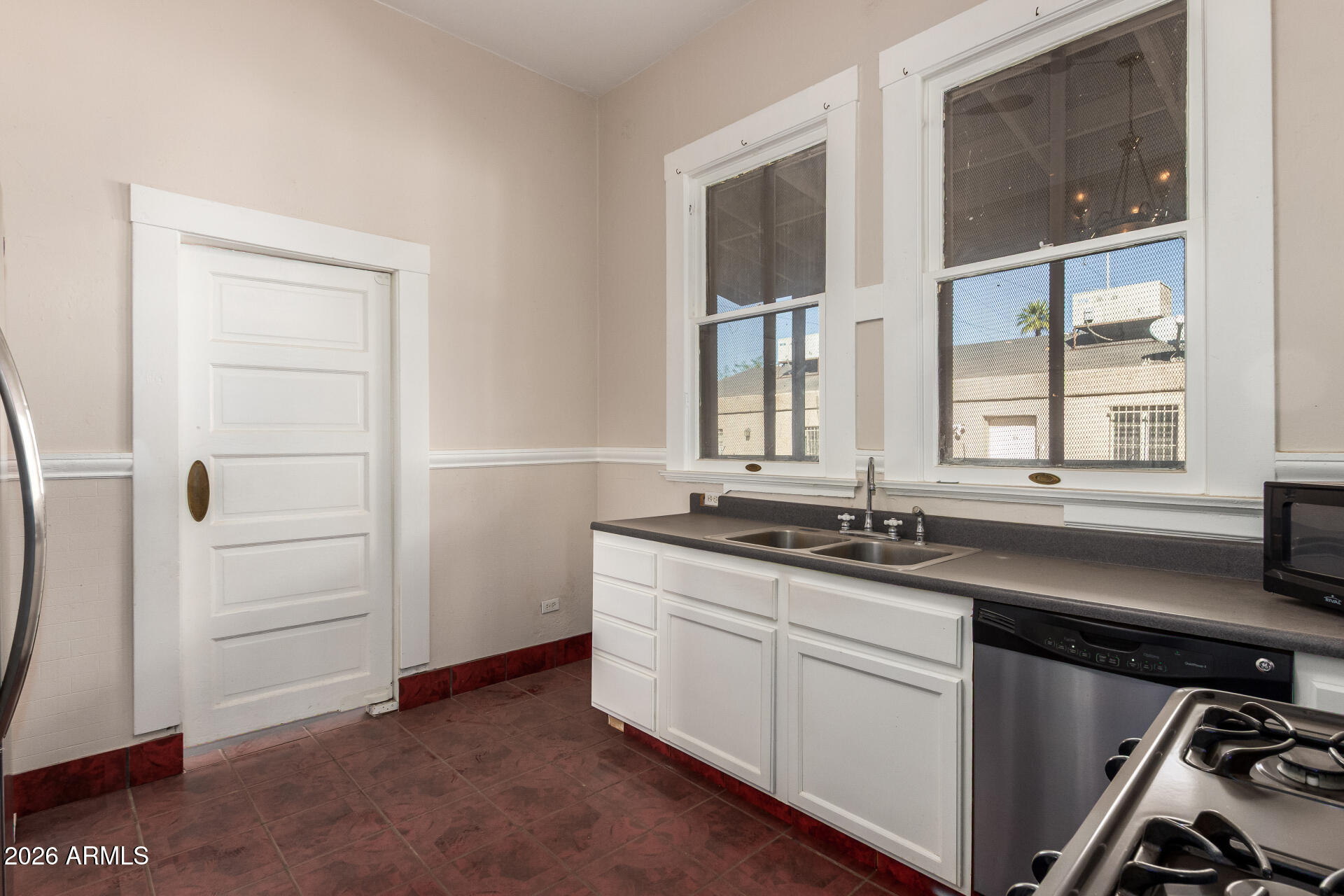 819 South 3rd Avenue Phoenix, AZ 85003 - Photo 16 of 45 a kitchen with a sink and a window