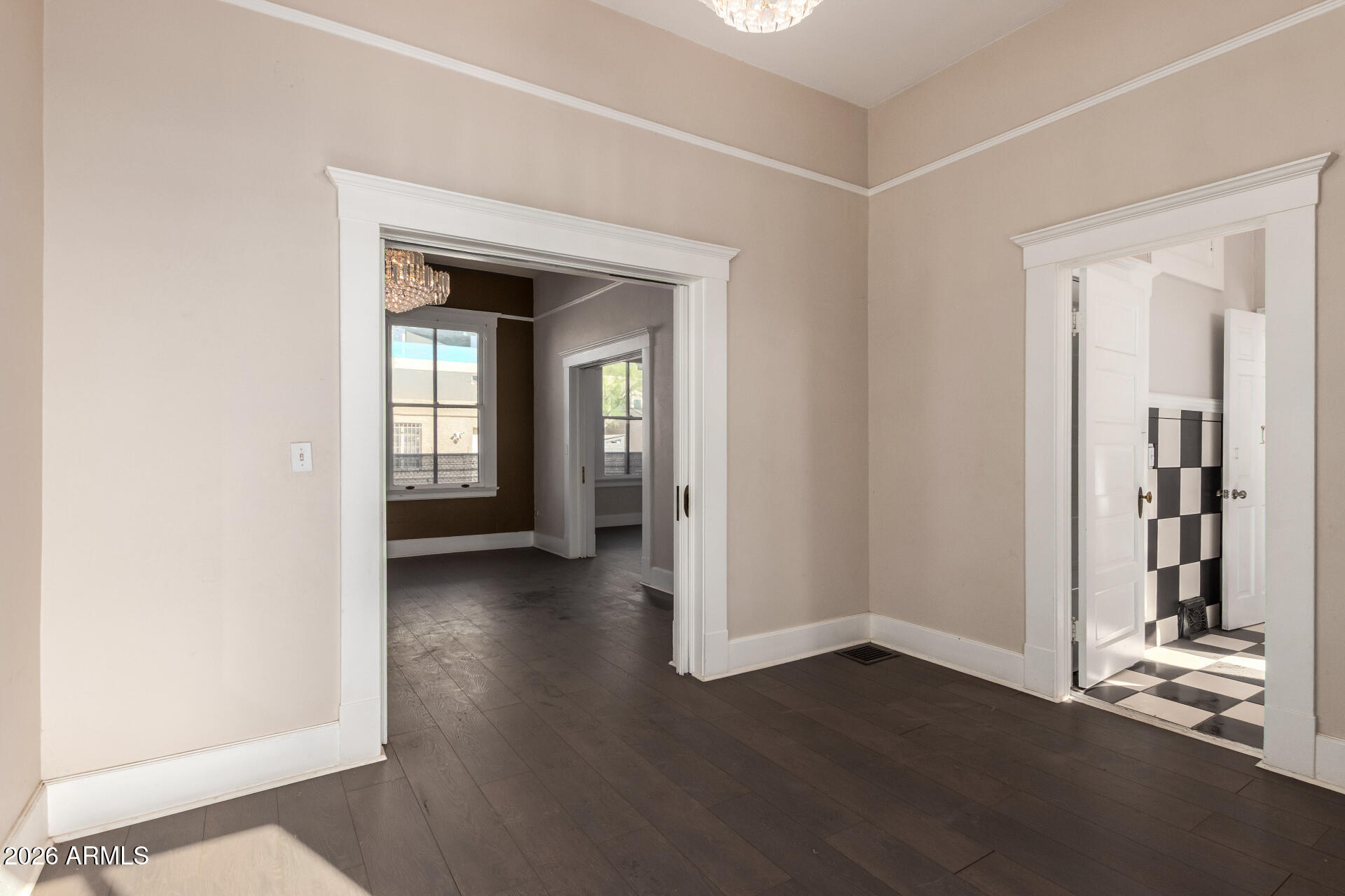 819 South 3rd Avenue Phoenix, AZ 85003 - Photo 18 of 45 an empty room with wooden floor and a window