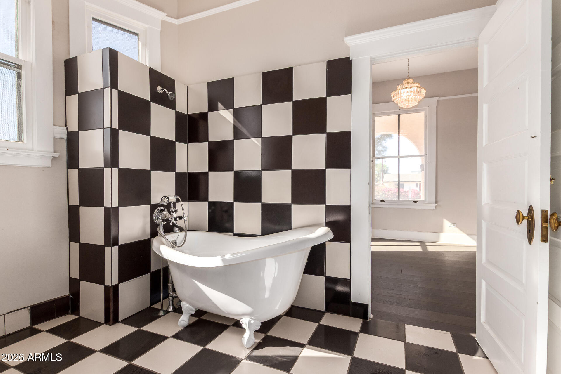 819 South 3rd Avenue Phoenix, AZ 85003 - Photo 22 of 45 a bathroom with a black and white checkered floor