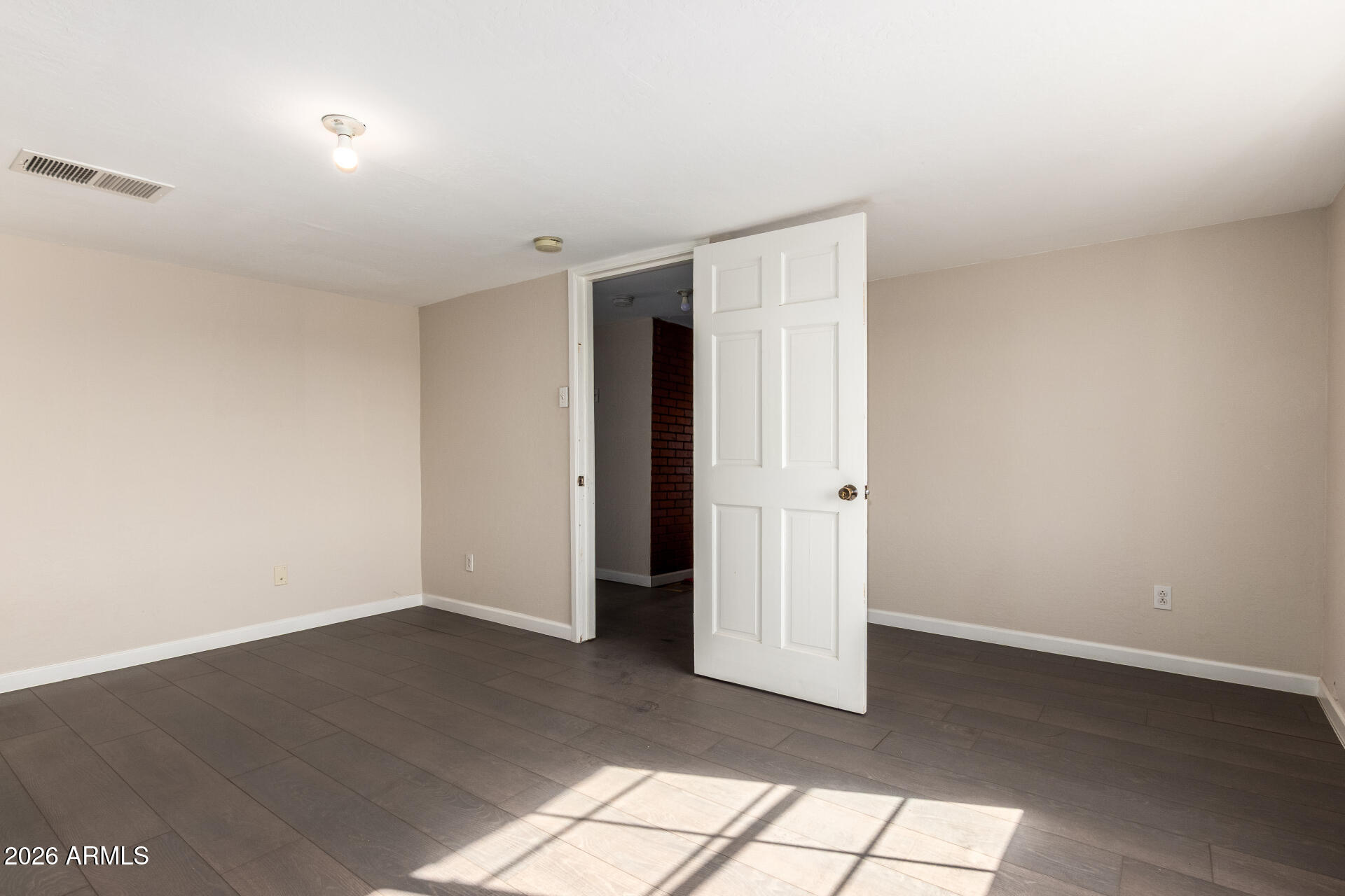 819 South 3rd Avenue Phoenix, AZ 85003 - Photo 37 of 45 wooden floor in an empty room