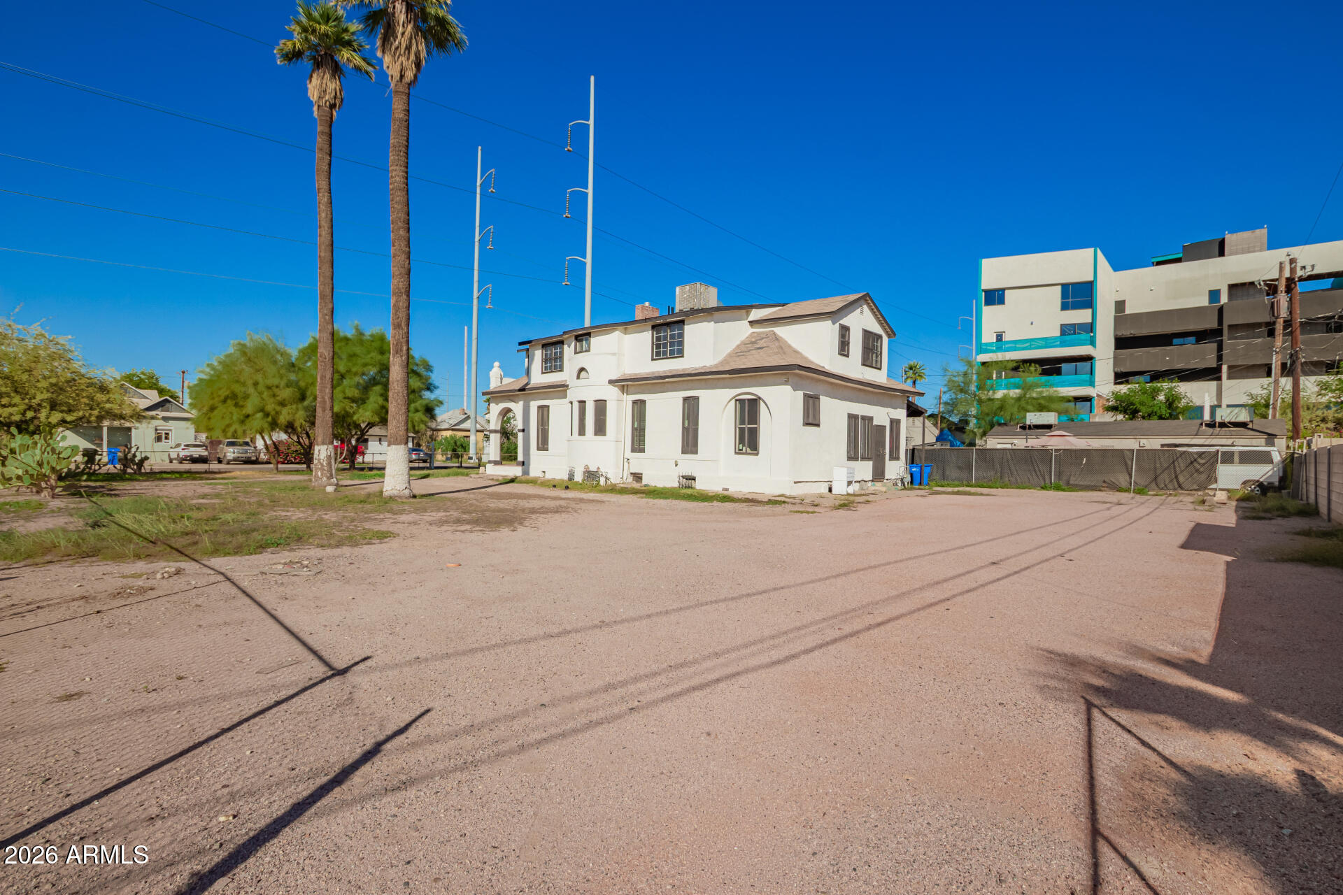 819 South 3rd Avenue Phoenix, AZ 85003 - Photo 42 of 45 a view of a tall building next to a yard