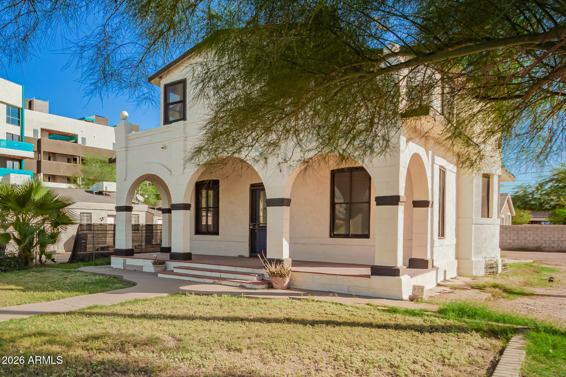 819 South 3rd Avenue Phoenix, AZ 85003 - Photo 6 of 45 a front view of a house with a yard