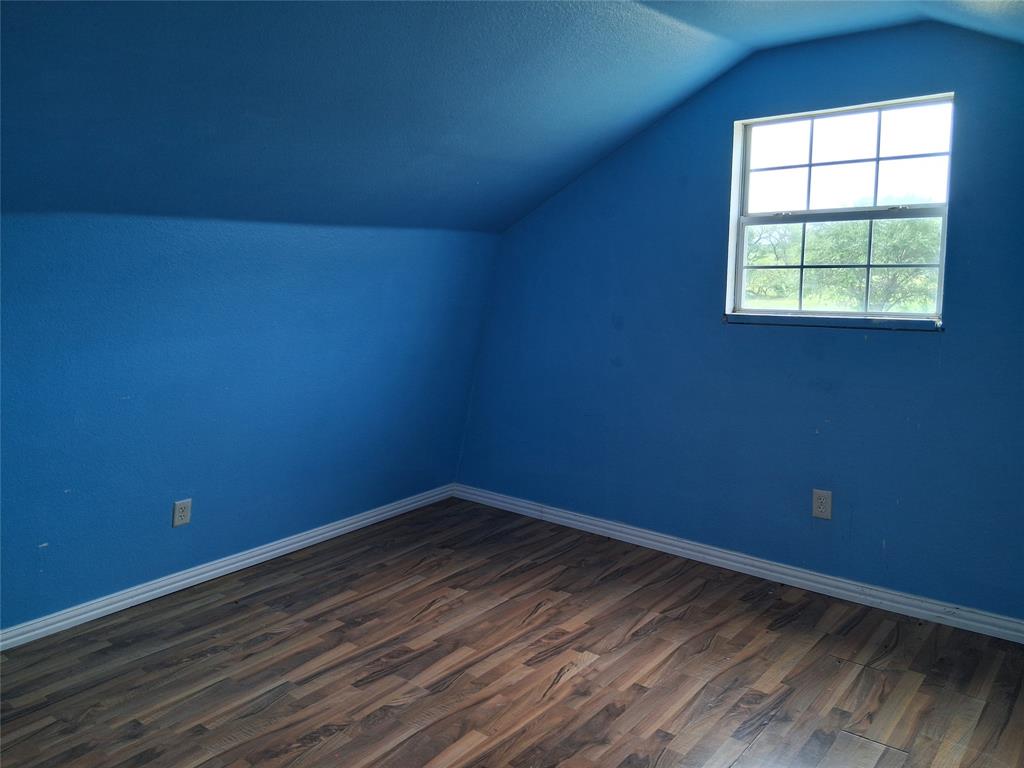 1584 Kelly Road, Unit B Aledo, TX 76008 - Photo 18 of 24 an empty room with a window