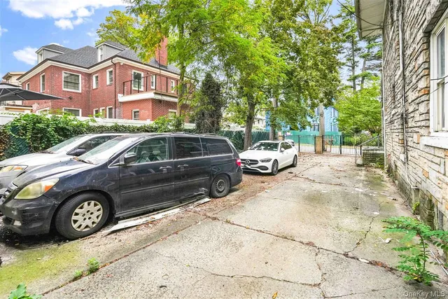 a view of a cars parked in a parking lot