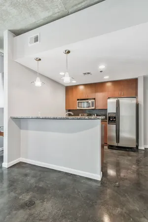 a view of a kitchen with a sink