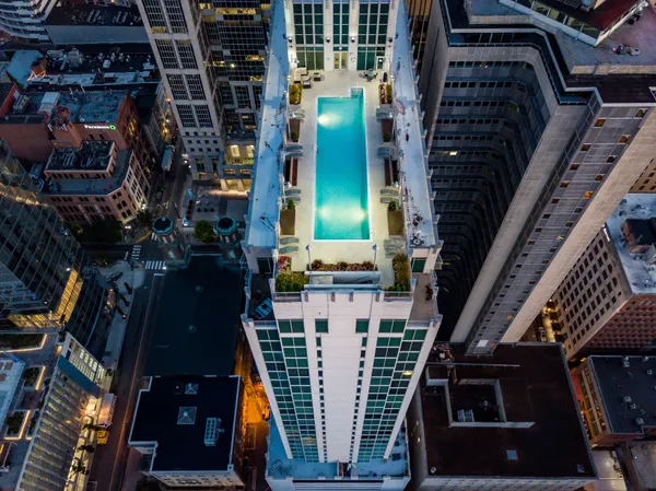 a view of a swimming pool with a lounge chairs