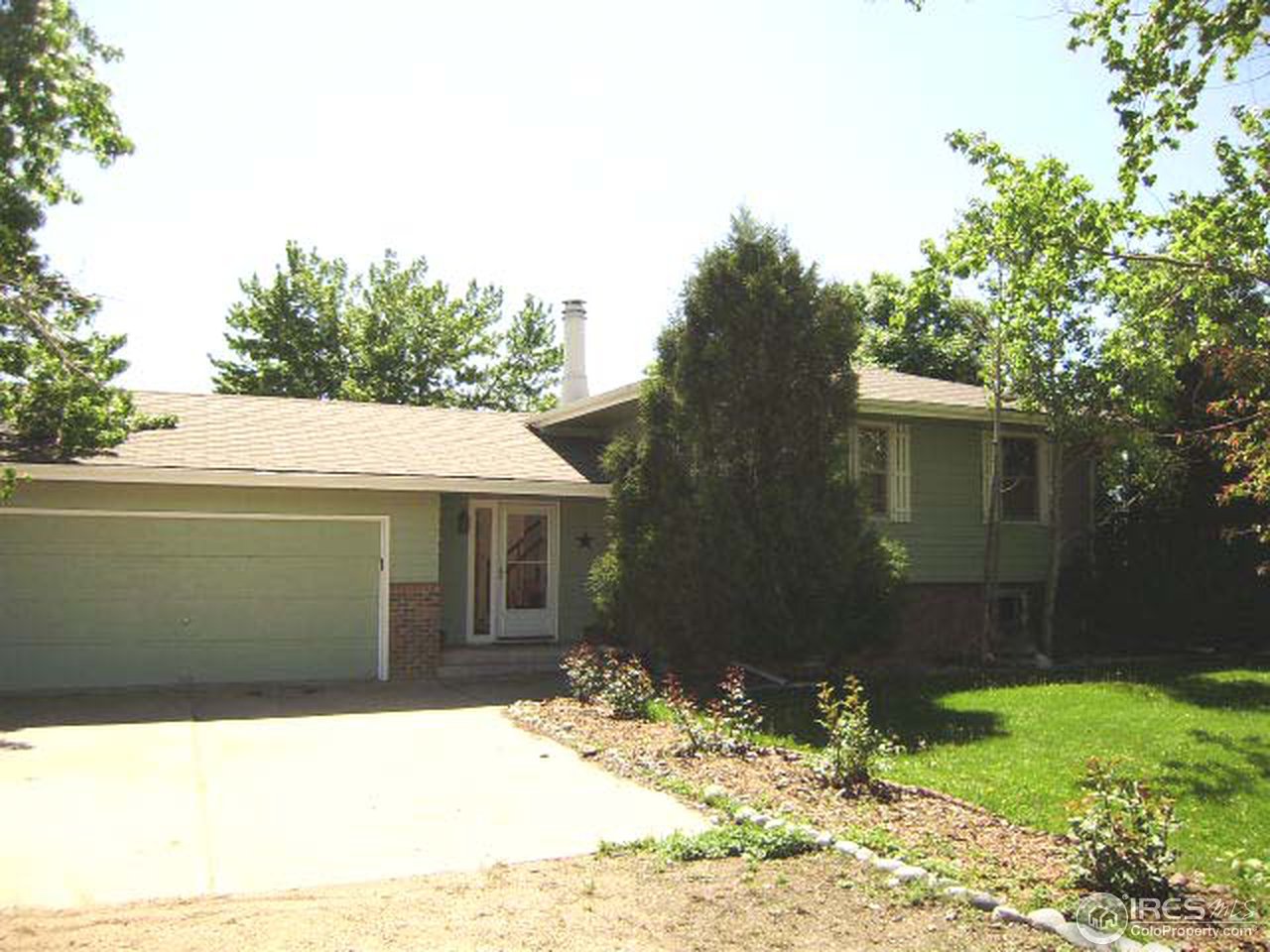9568 Phillips Road Lafayette, CO 80026 - Photo 1 of 18 a view of house with yard