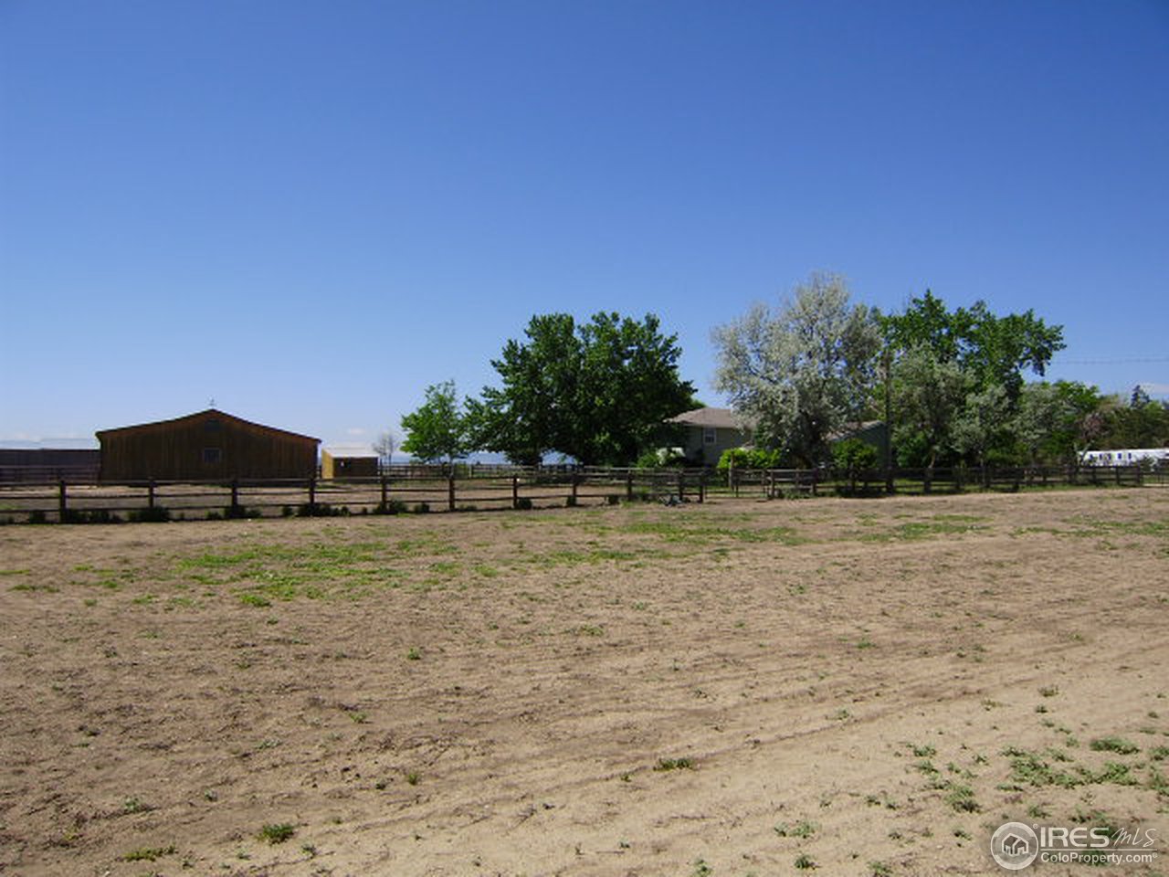 9568 Phillips Road Lafayette, CO 80026 - Photo 6 of 18 a view of a house with a yard