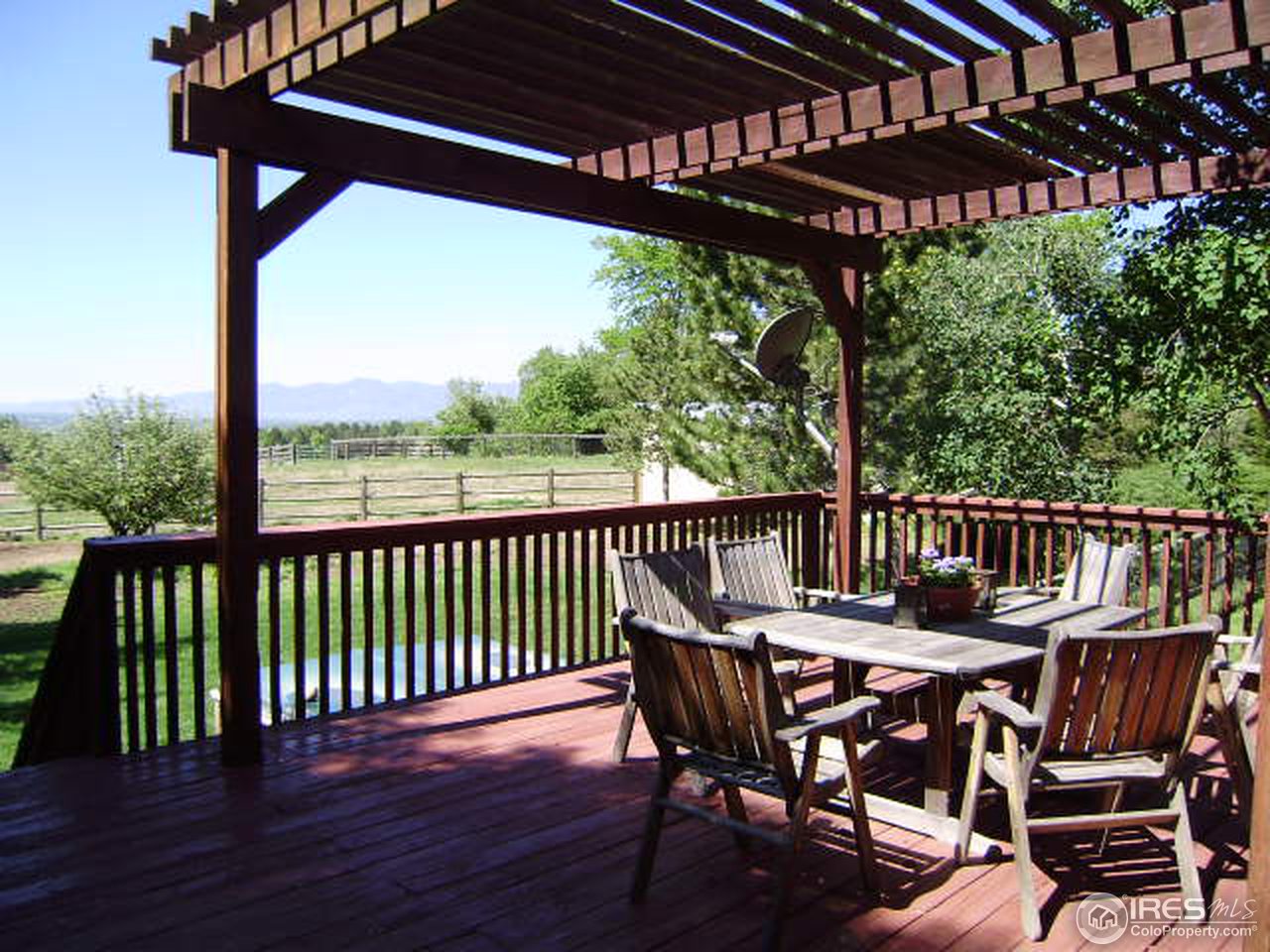 9568 Phillips Road Lafayette, CO 80026 - Photo 7 of 18 a view of a chairs and table in the roof deck
