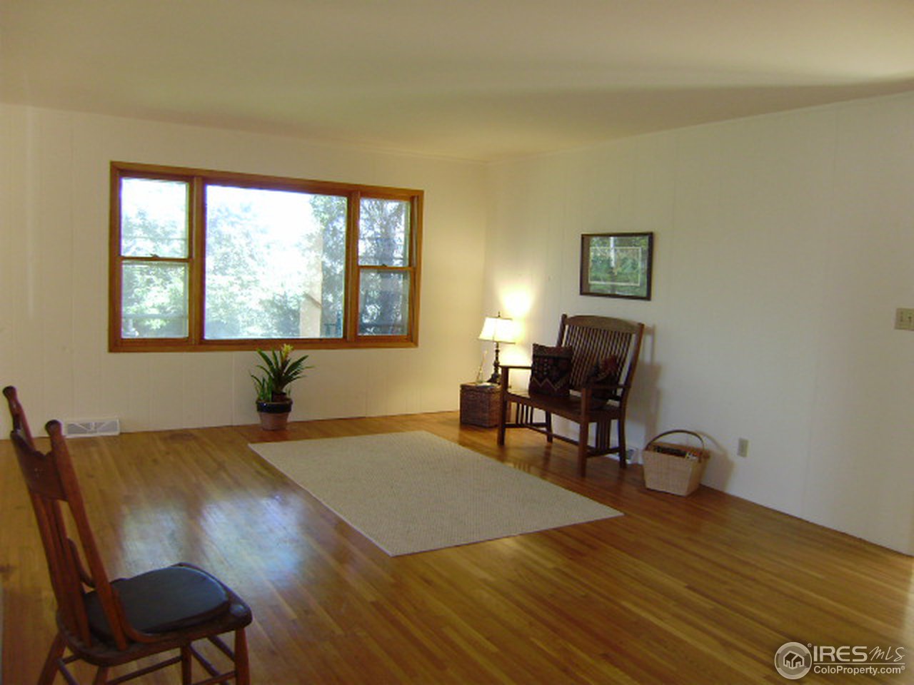 9568 Phillips Road Lafayette, CO 80026 - Photo 9 of 18 a living room with furniture and a window