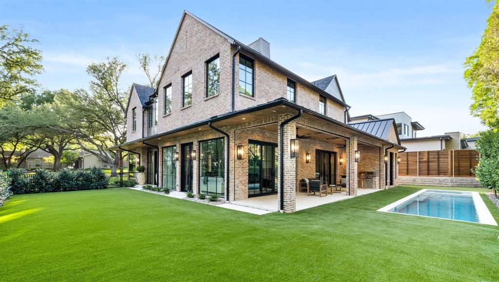 3944 Dalgreen Drive Dallas, TX 75214 - Photo 29 of 38 a view of a house with a yard and deck