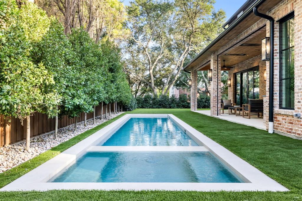 3944 Dalgreen Drive Dallas, TX 75214 - Photo 33 of 38 a view of backyard with swimming pool and outdoor seating