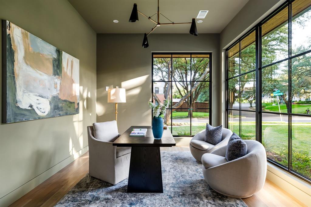 3944 Dalgreen Drive Dallas, TX 75214 - Photo 5 of 38 a living room with furniture and a floor to ceiling window