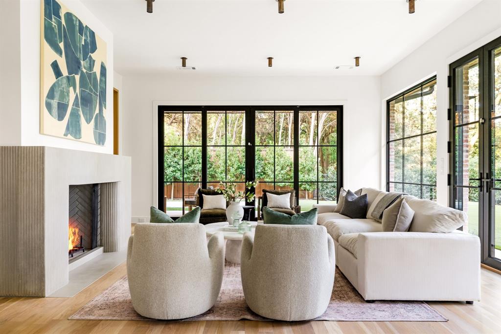 3944 Dalgreen Drive Dallas, TX 75214 - Photo 7 of 38 a living room with furniture and a large window
