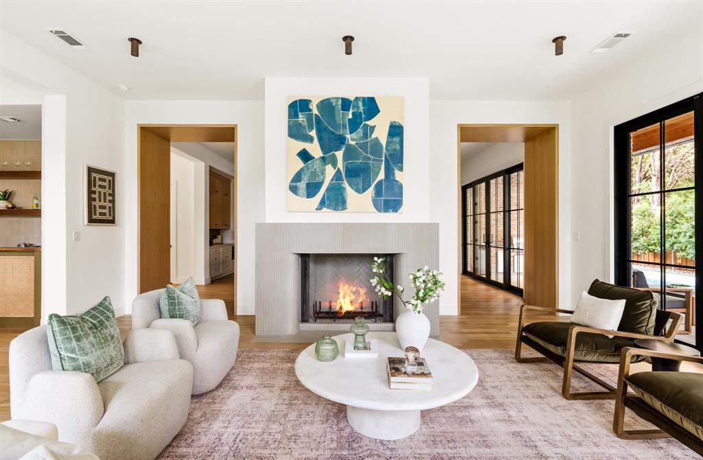 3944 Dalgreen Drive Dallas, TX 75214 - Photo 8 of 38 a living room with furniture and a fireplace