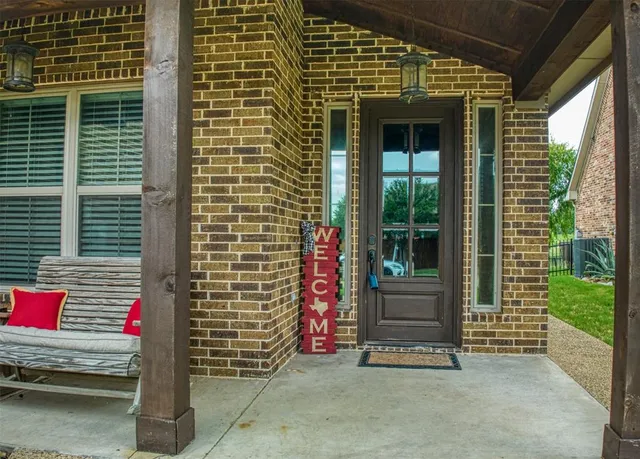 a front view of a house with a garage