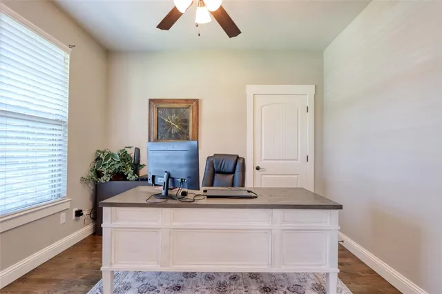 a view of living room with furniture and window