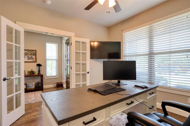 a view of a workspace with furniture