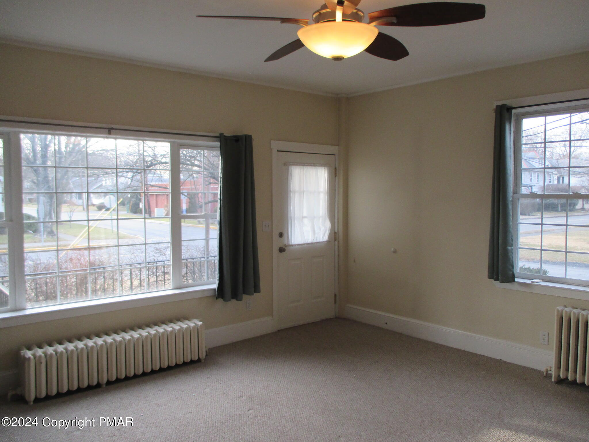 128 Broad Street Stroudsburg, PA 18360 - Photo 5 of 18 an empty room with windows